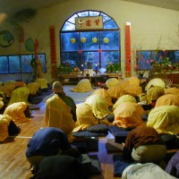 Monks in Formal Robes Bowing in Meditation